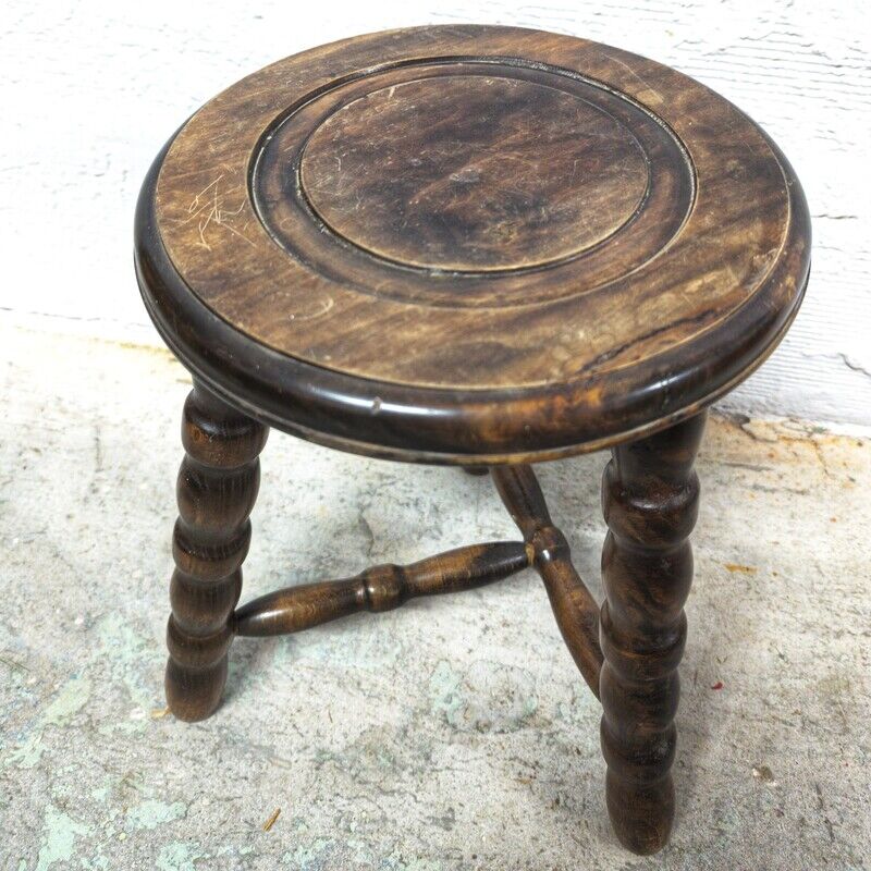 Tripod wooden stool turned