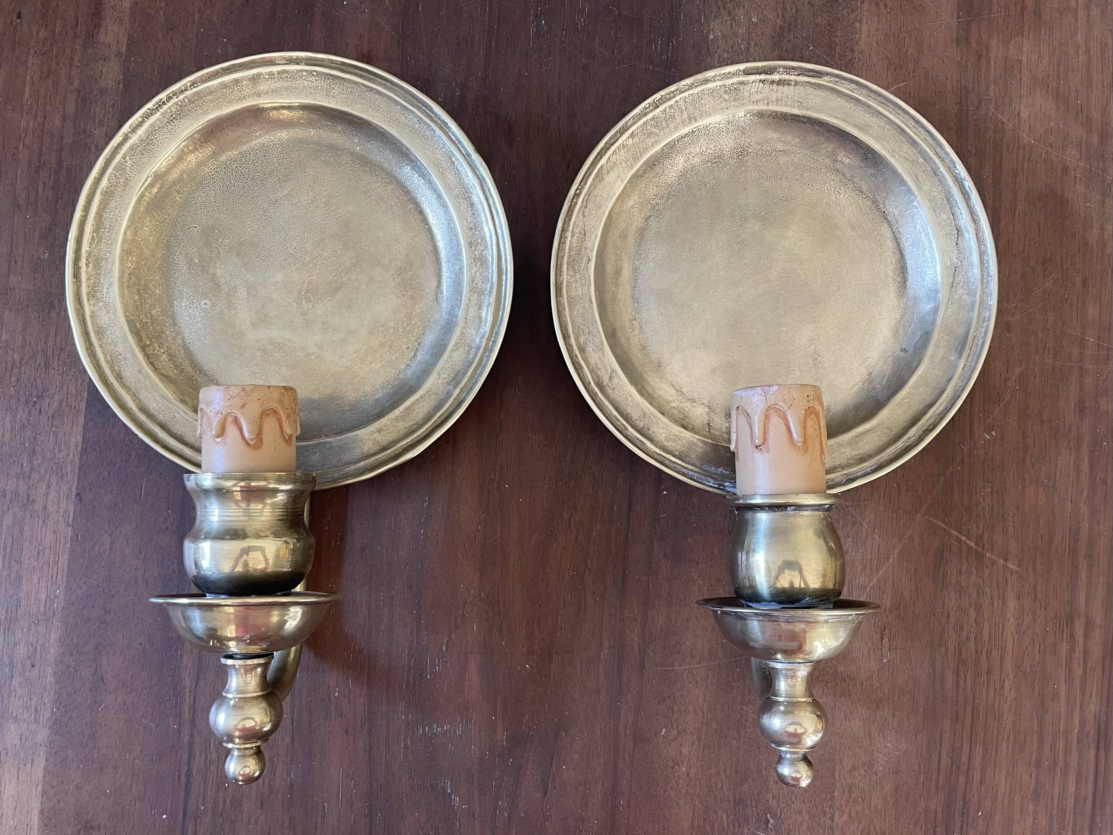 Pair of vintage wall sconces in textured brass, brutalist style.