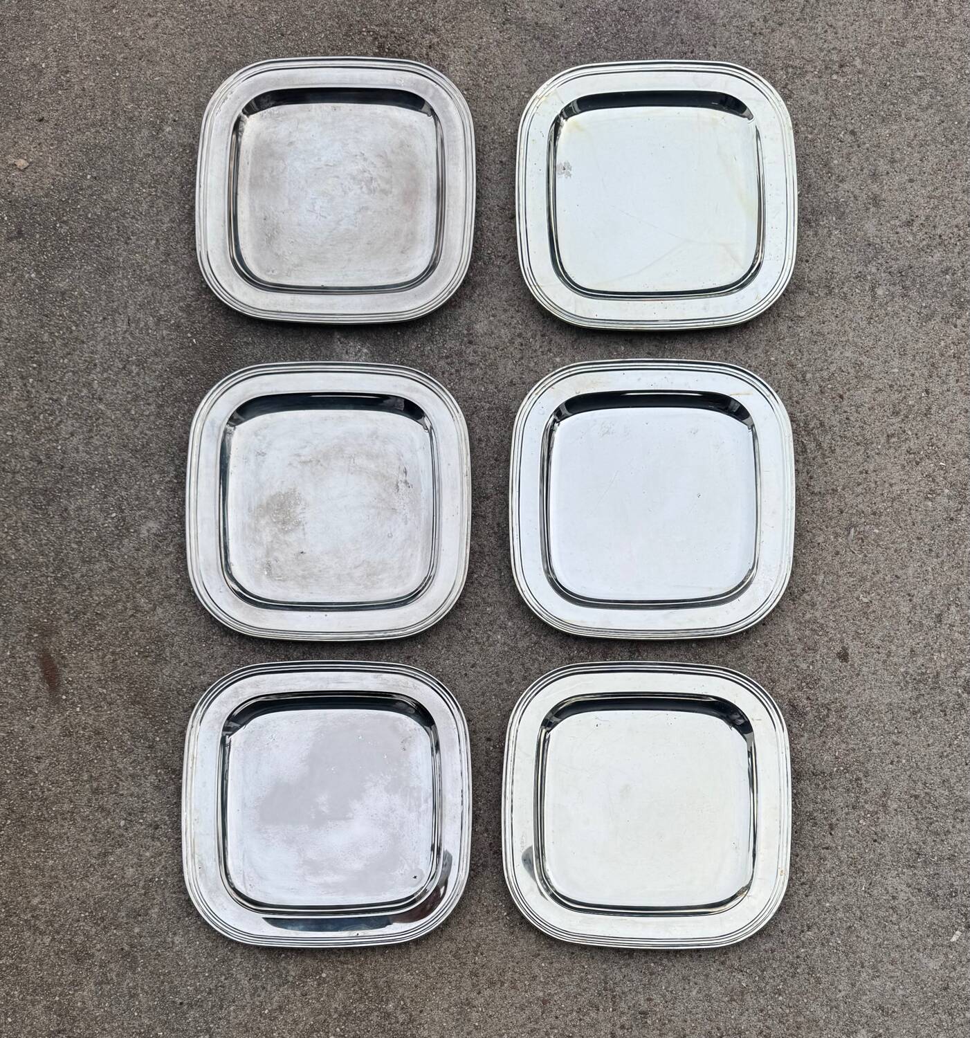 Silver-plated metal underplates from the 1980s.