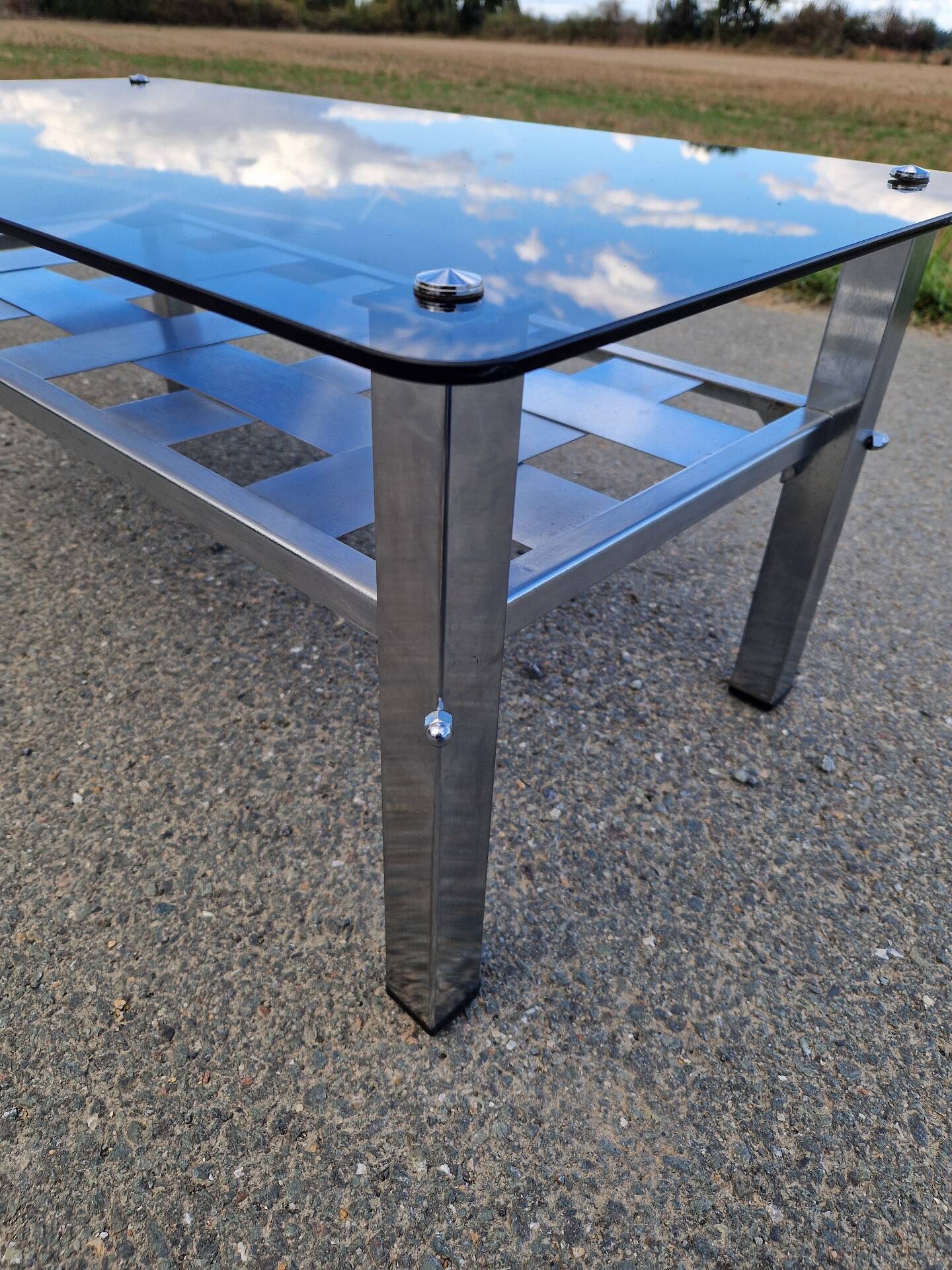 Stainless steel and smoked glass coffee table
