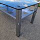 Stainless steel and smoked glass coffee table