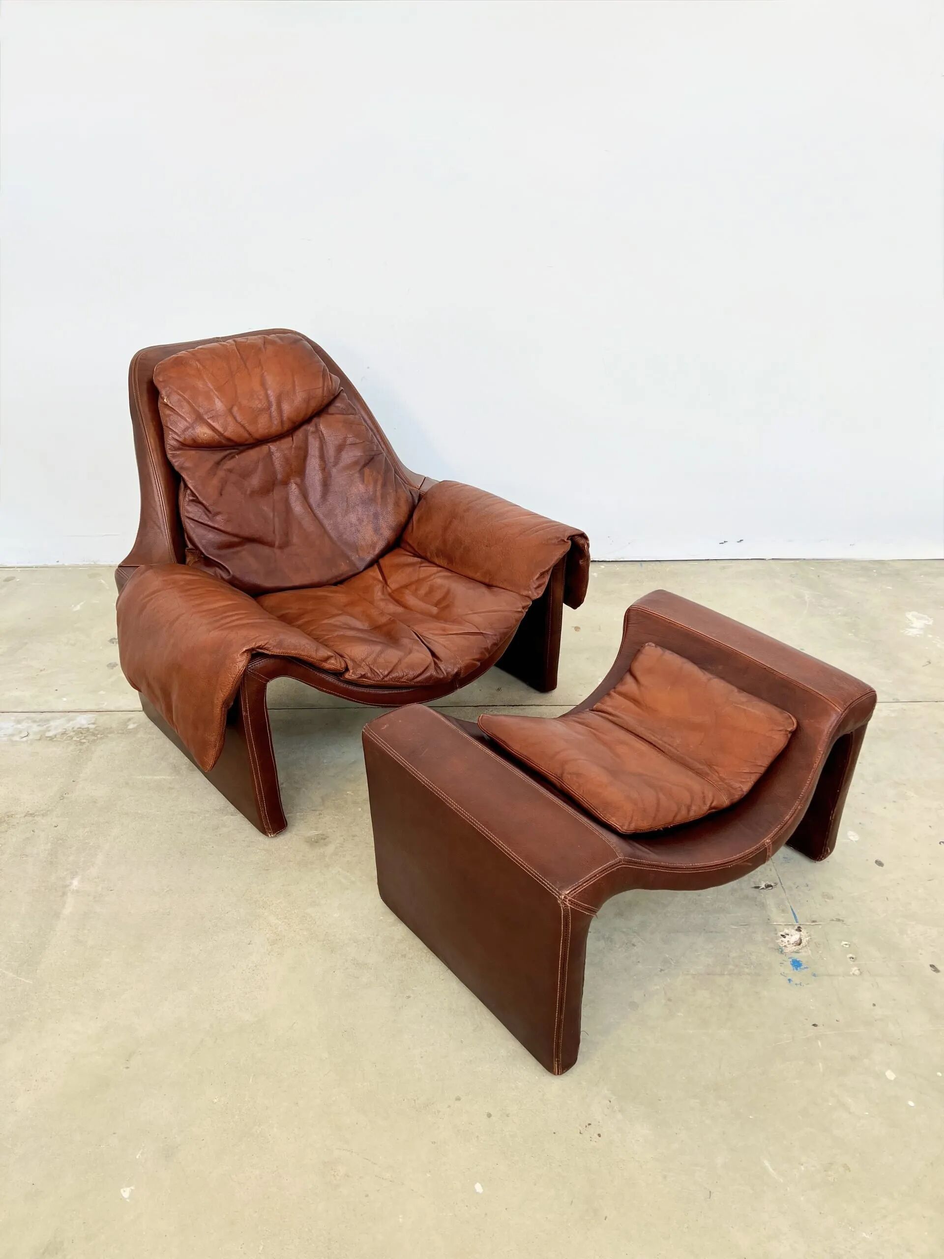 Havana leather armchair and ottoman P60