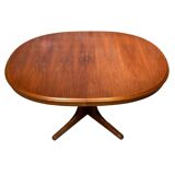 Baumann style wooden table with extensions.