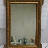 Mirror with gilded wood and stucco frame, early 20th century, 59x83cm