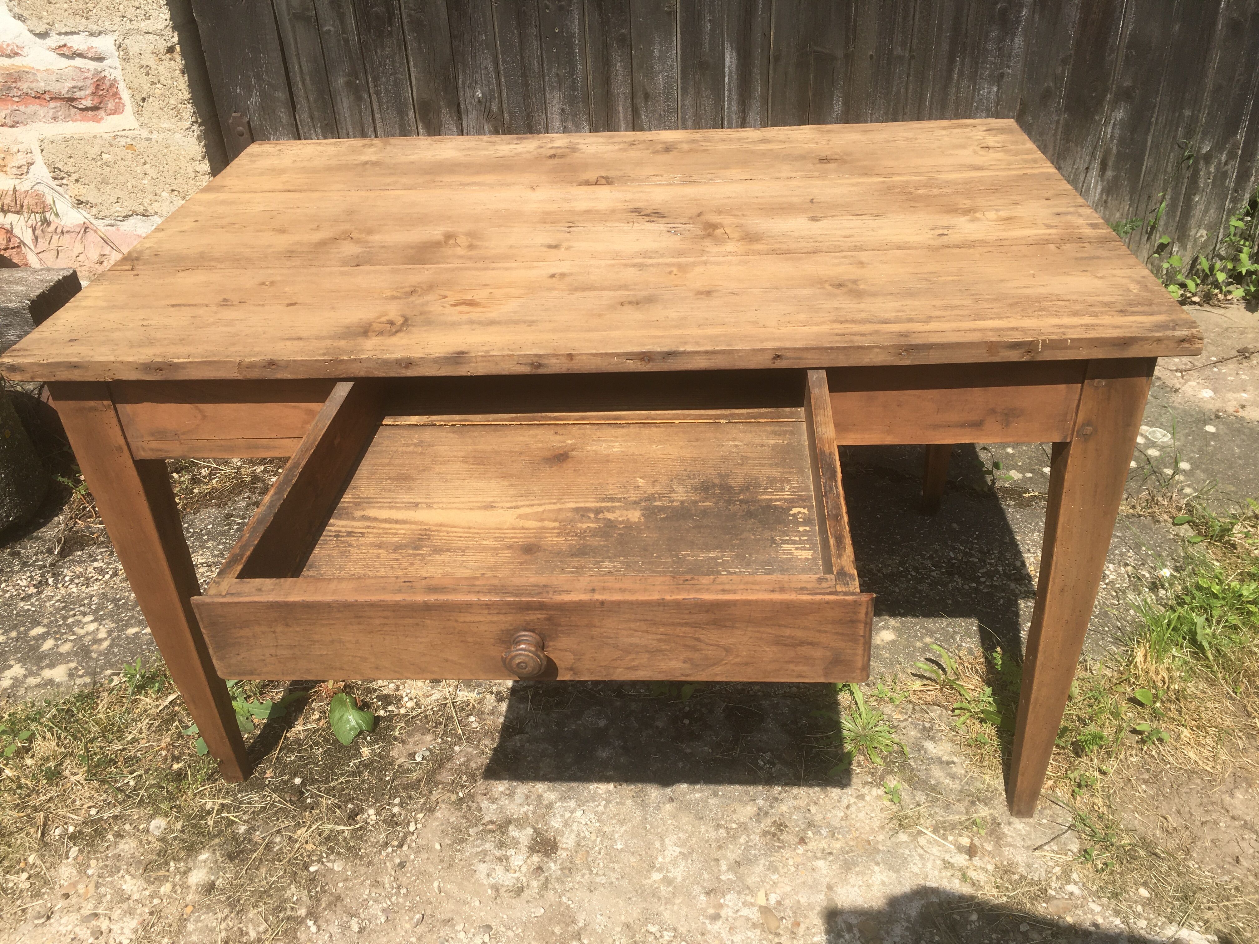 Farmhouse table with raw wood drawer