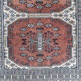 Vintage hand knotted rug with geometric patterns on a grey/beige/terracotta background 170 x 96 cm