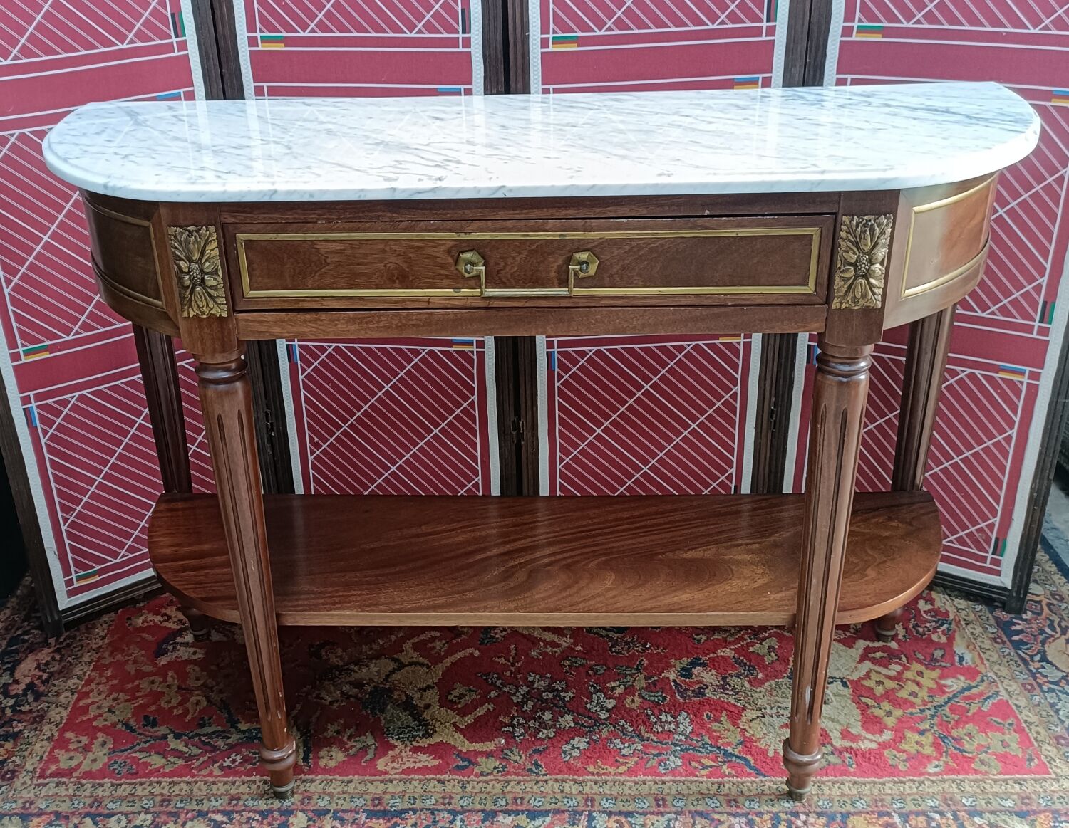 Louis XVI style half-moon console with veined white marble and drawer