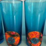 Six blue blown glass and enamel on copper glasses.