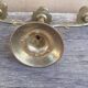 Three-light chandelier in brass metal