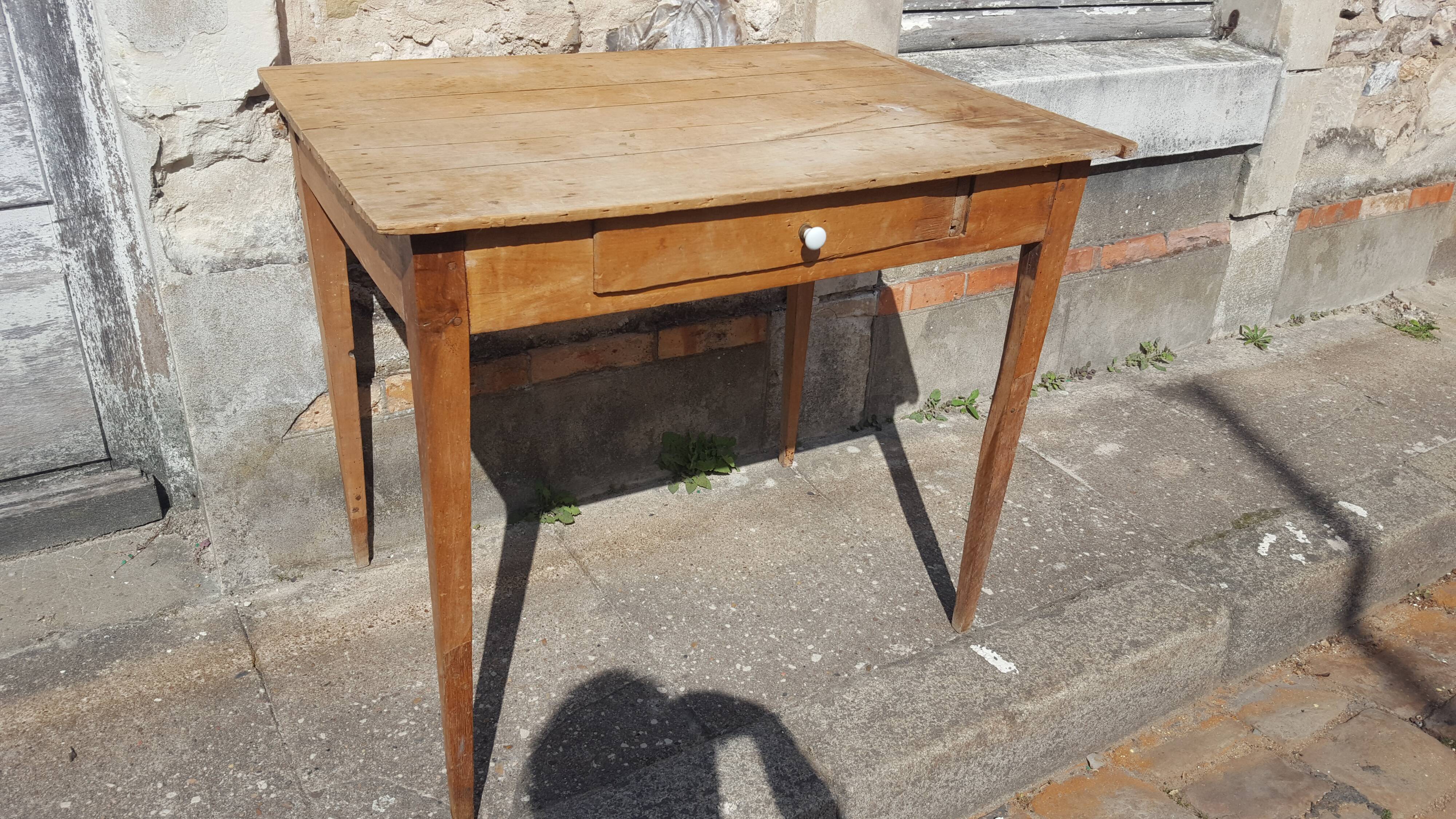 Raw wood farm table with drawer