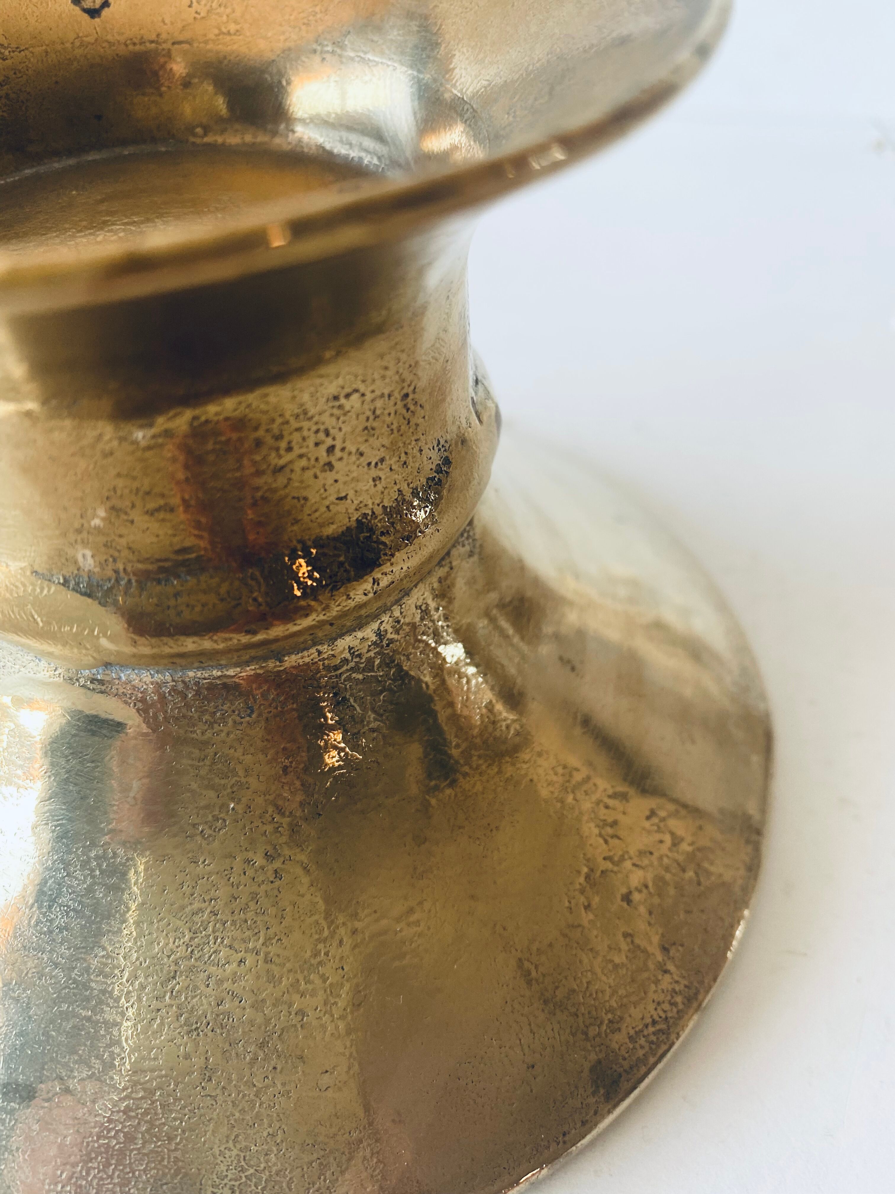 Old bronze church candle holder