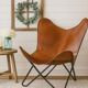 Handmade leather butterfly chair, modern lounge seating.