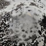 Blown glass vase with black snake decoration with white speckles