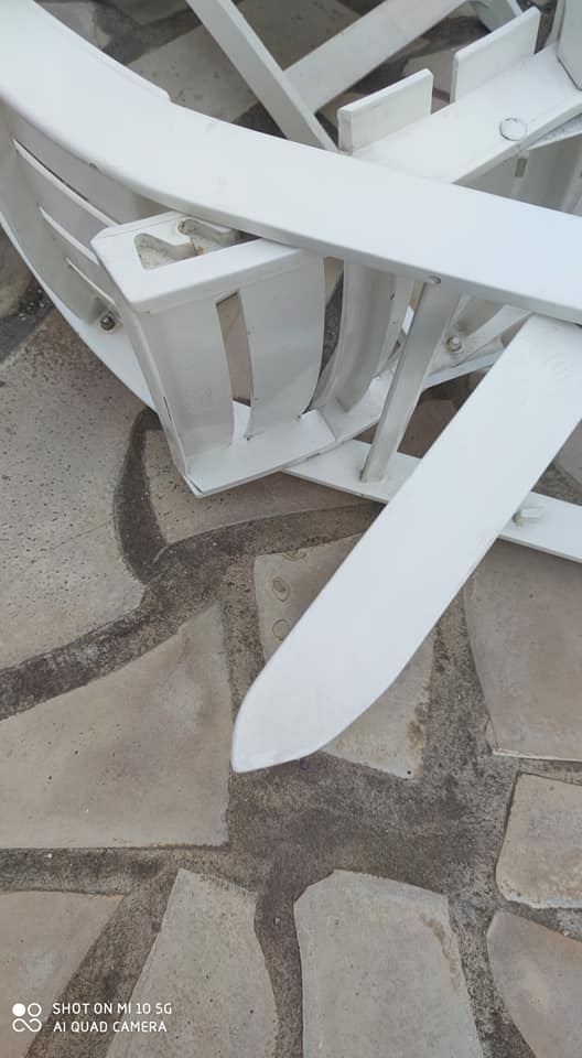 Four Grosfillex armchairs