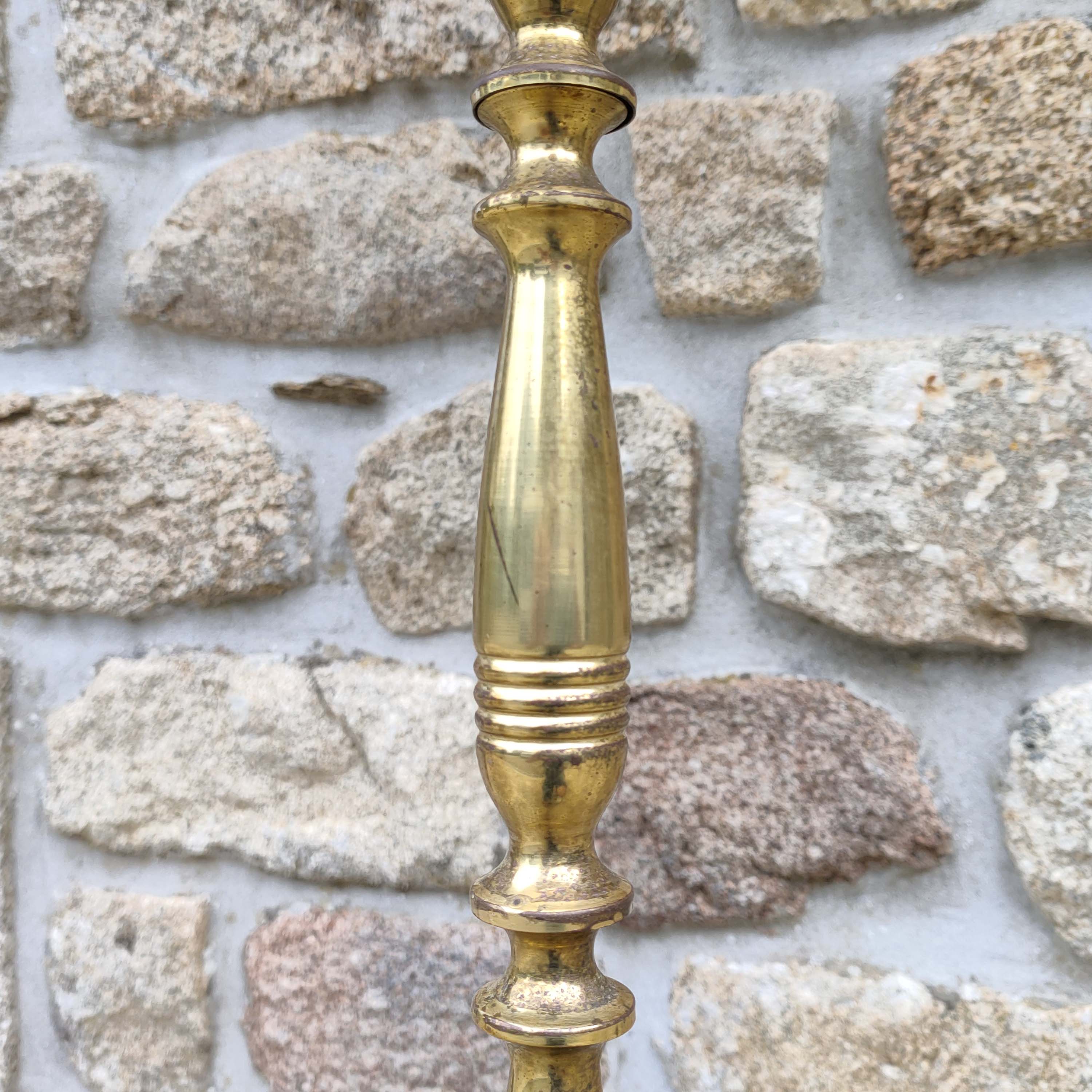 Tripod golden floor lamp