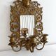 Bevelled mirror wall sconce in gilded bronze with 3 candle holders.