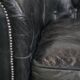 Black cowhide leather chesterfield armchair