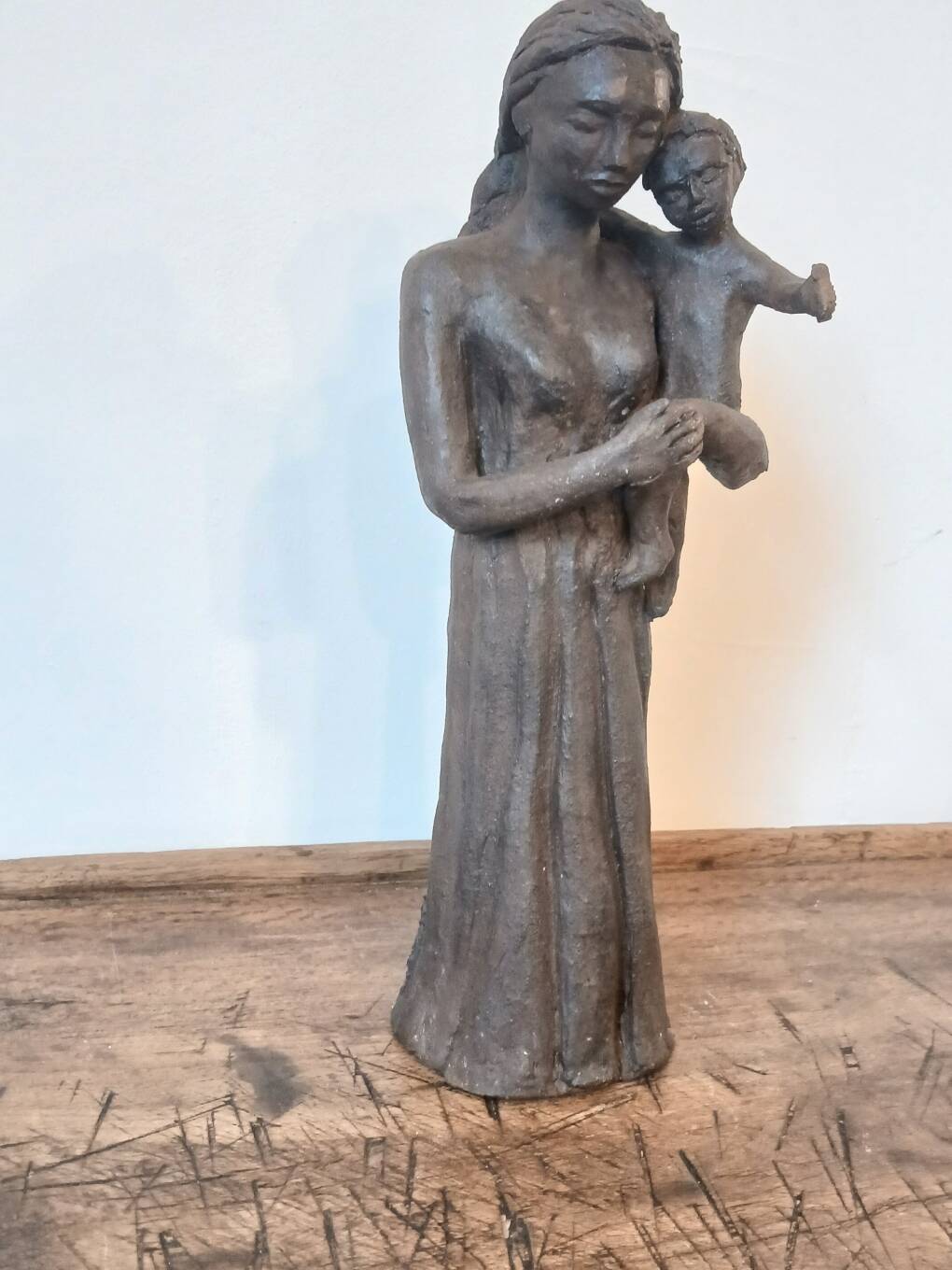Sculpture representing a woman holding a child - original terracotta