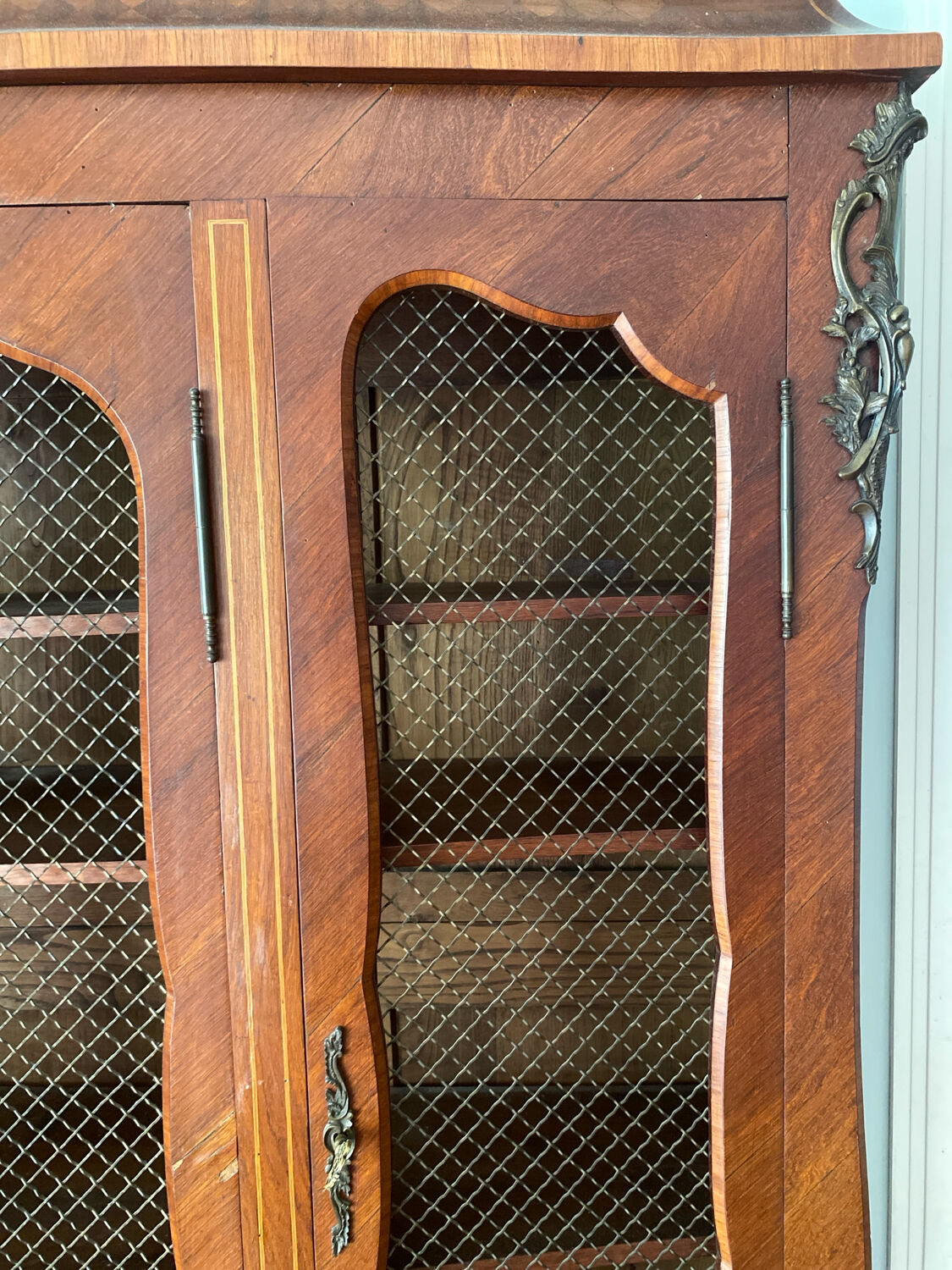 Wire mesh and wood bookshelf