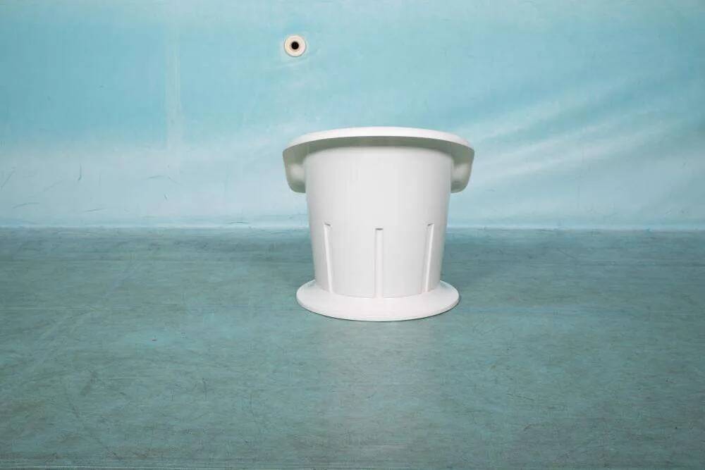 Space-age shell chair with storage, Ikea Popptorp chair.