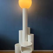 White floor lamp "Close Encounter" and plant stand by Kerst Koopman