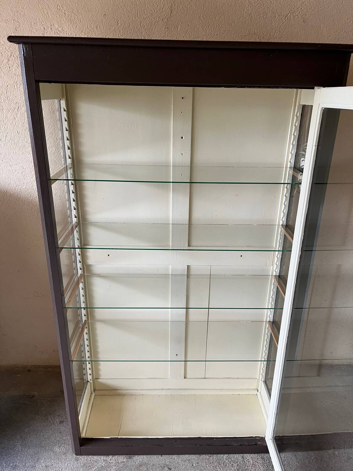 Old wooden glass display case