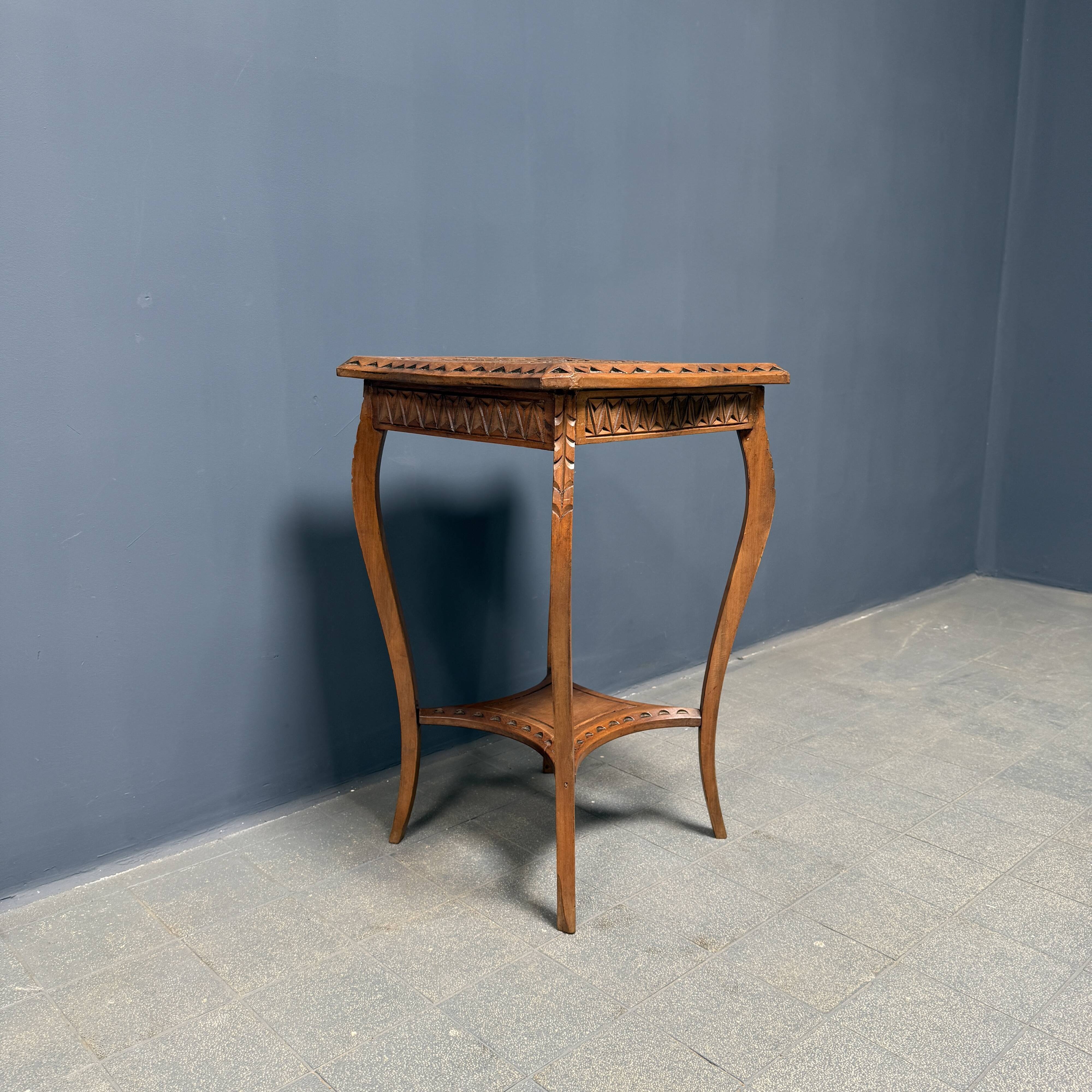 Graceful antique carved wooden side table