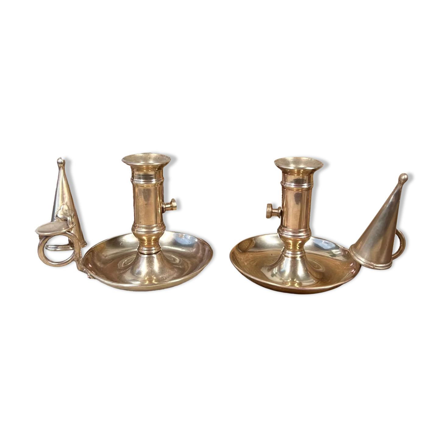Duo of brass cellar rat candlesticks with extinguisher