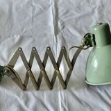 Workshop lamp on accordion arm.