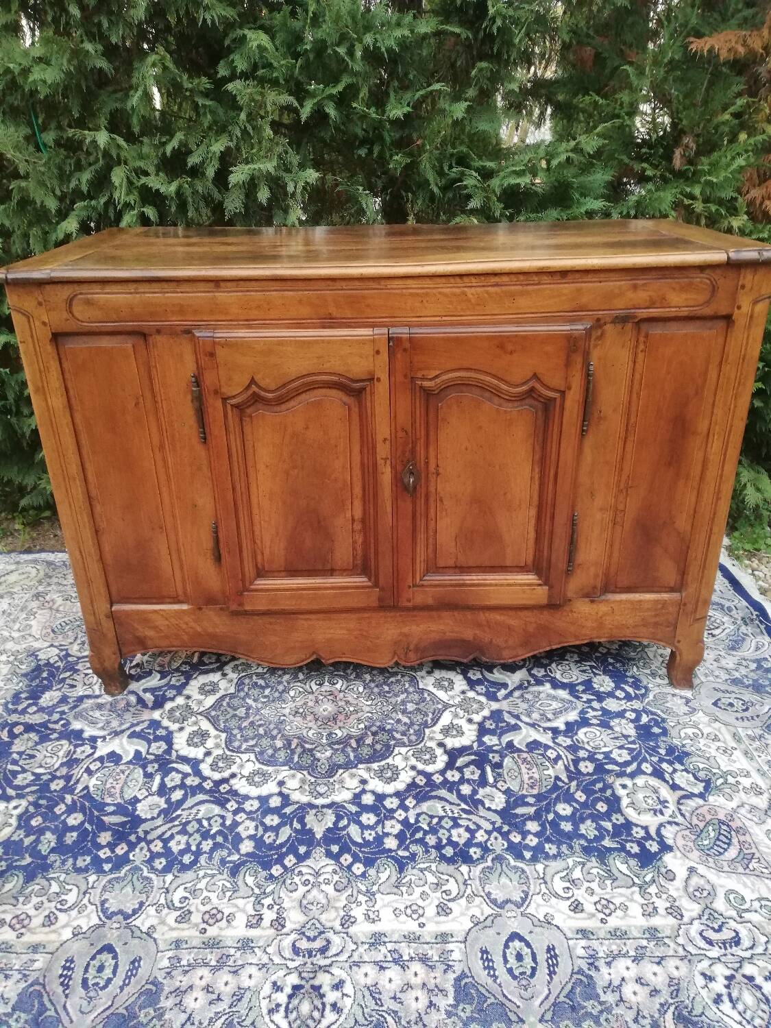 A Louis XV walnut sideboard