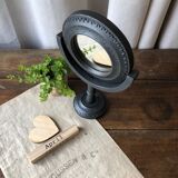 Wooden mirror on foot