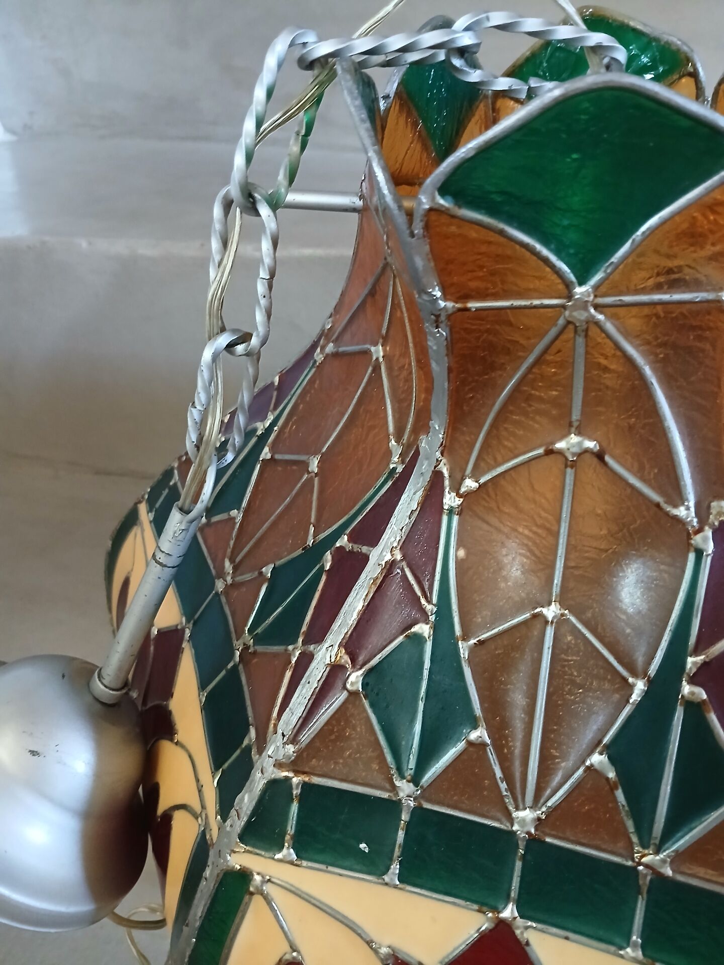 Vintage pendant light with multicoloured stained glass.