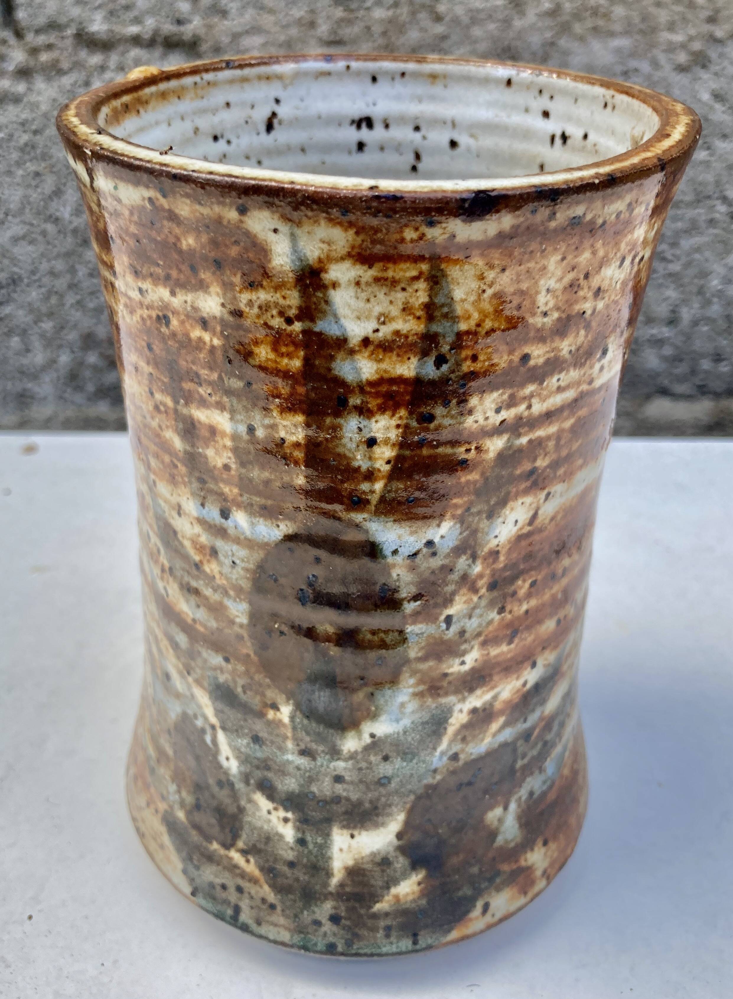 glazed ceramic vase with abstract flower decoration, signature to identify