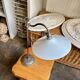 Lampe col de cygne en métal et opaline blanche