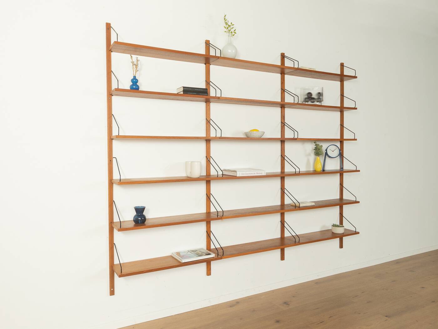 Classic wall shelf by Poul Cadovius for Cado, 1950s, teak veneer, 18 shelves, 4 ladders, Denmark