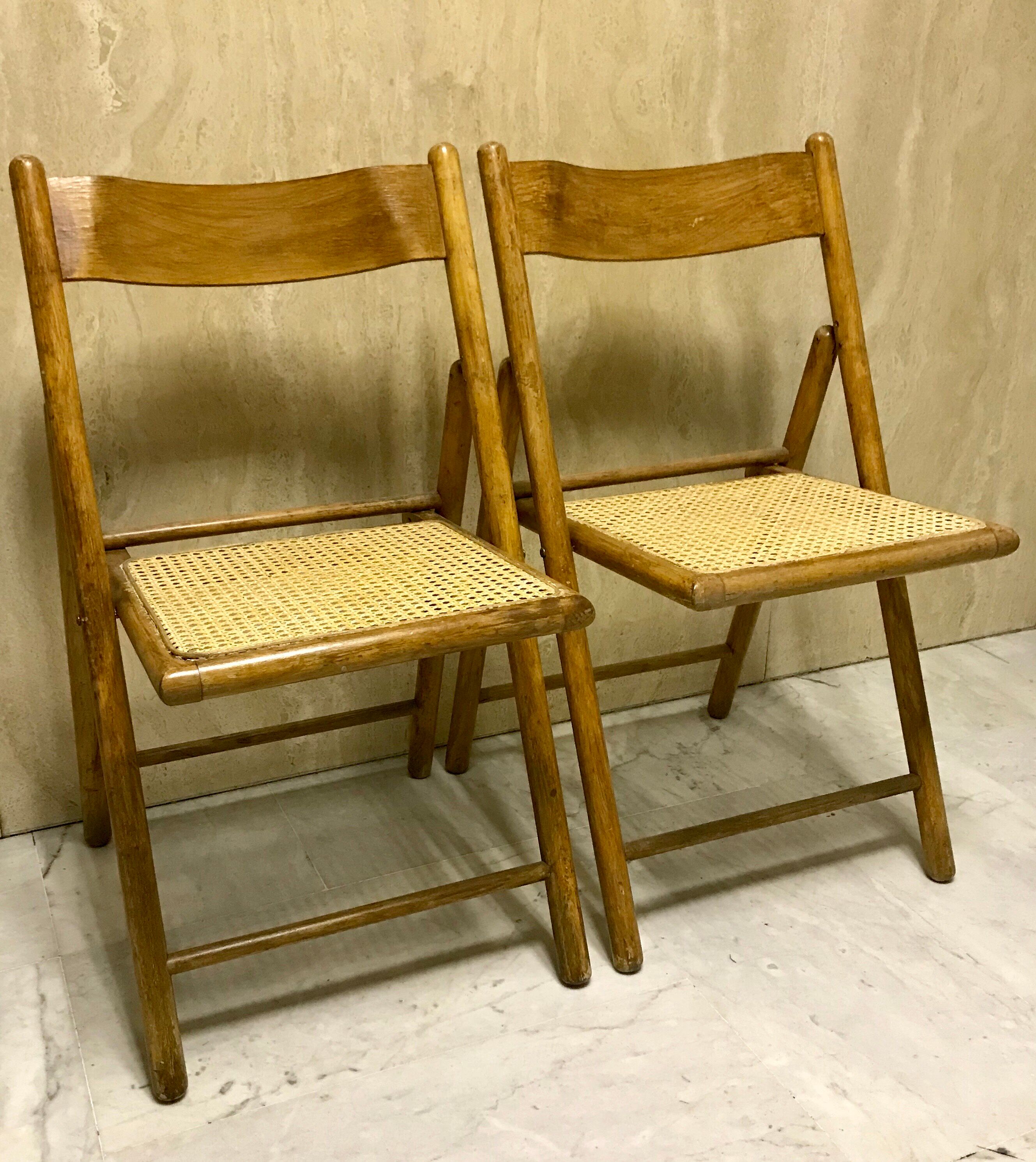 Duo of canned folding chairs