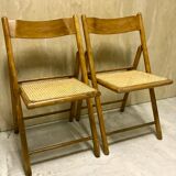 Duo of canned folding chairs