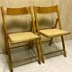 Duo of canned folding chairs