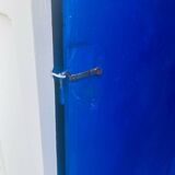 Antique white Parisian wardrobe with Majorelle blue interior