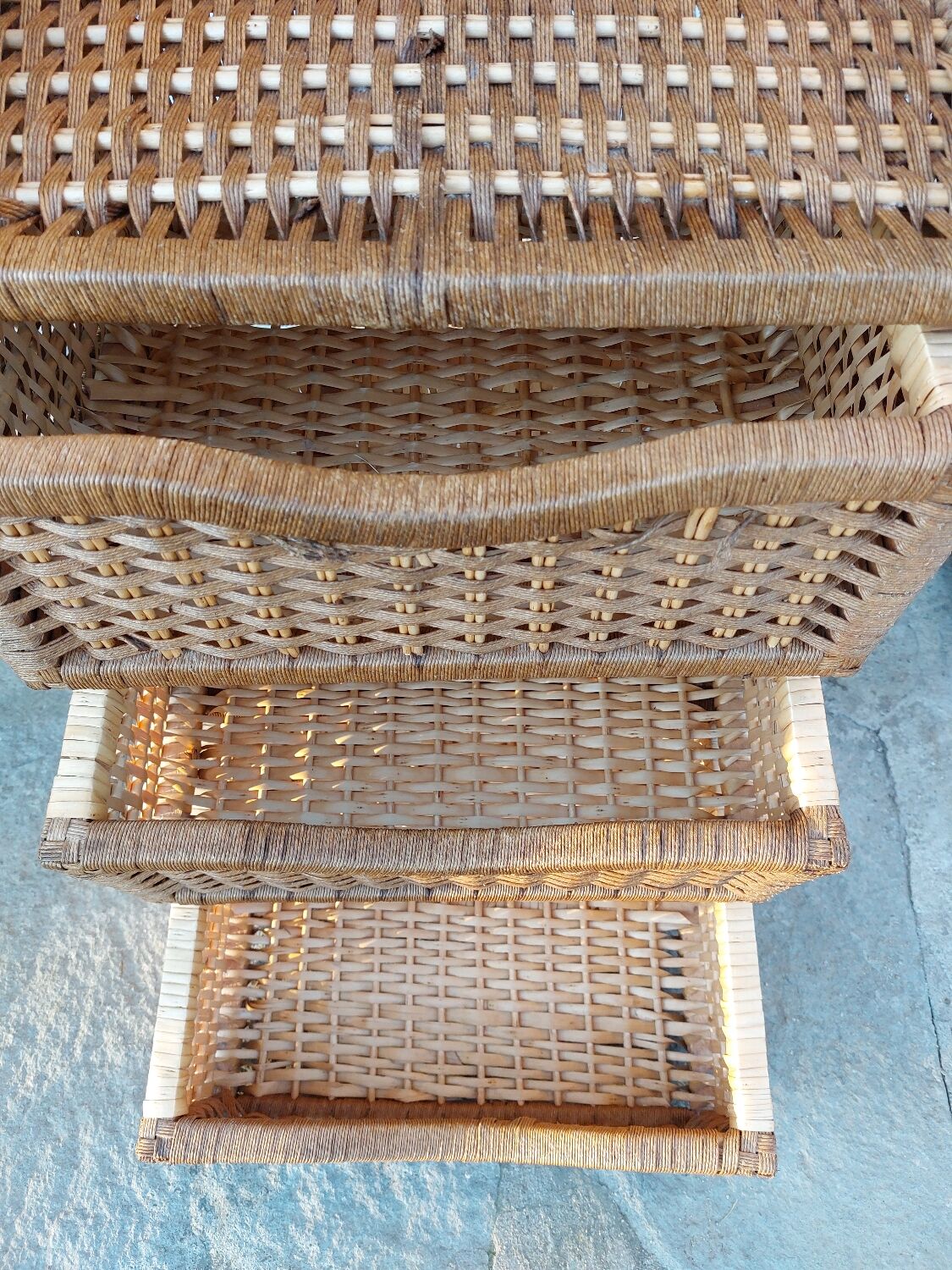 Wicker chest of drawers and rope