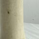 Minimalist beige ceramic vase.