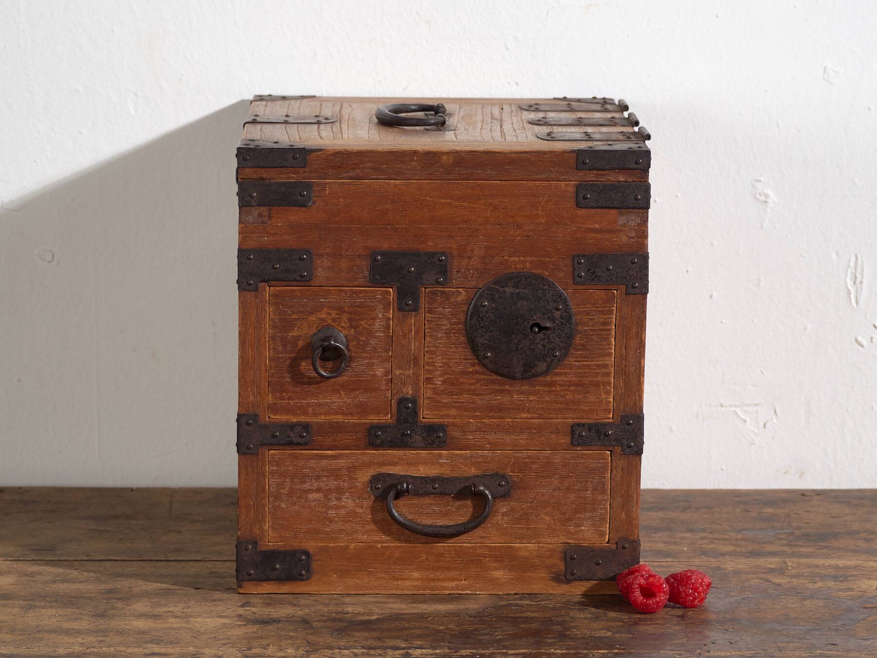 Japanese ko-dansu with hinged lid and paulownia wood drawers, Meiji–Taishō period, circa 1868–1926.