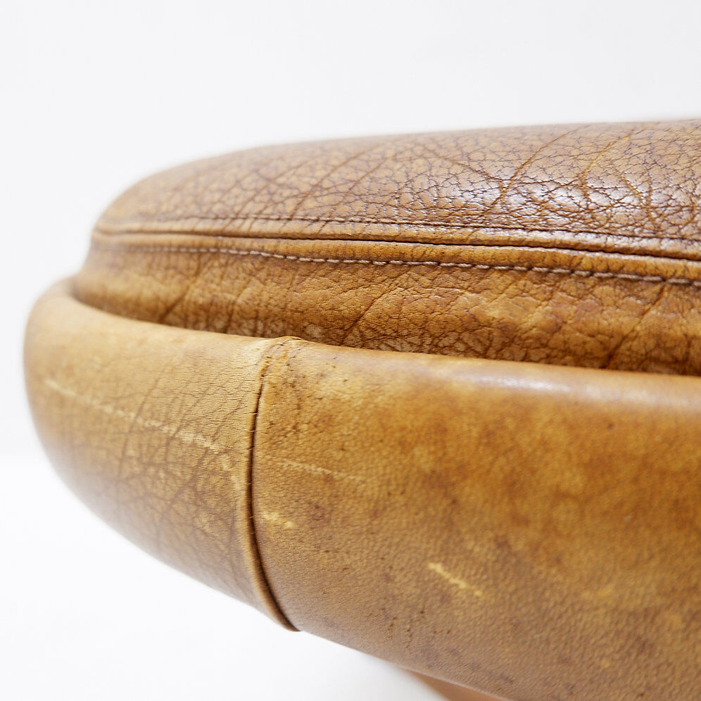 Brown leather swivel footrest with metal base - De Sede, Switzerland.