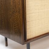 Sideboard in wenge, raffia and lacquered metal. 1970s.