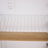 Modular wall shelf String.