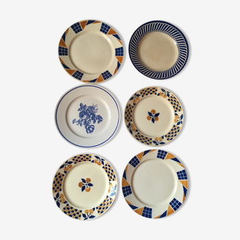 Six assiettes plates dépareillées en brun et bleu
