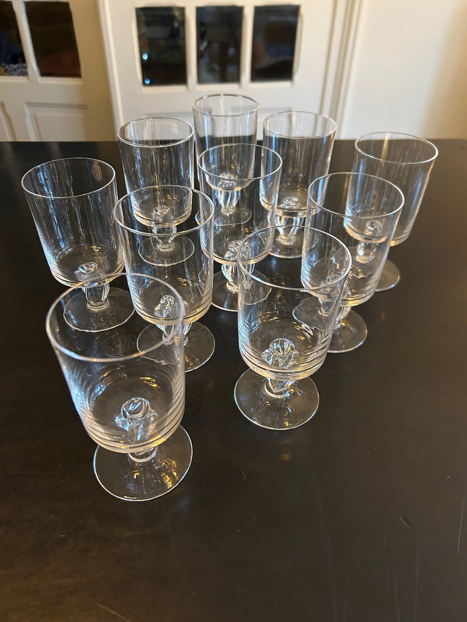 10 old glasses with twisted stems