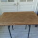 Table, tubular pedestal metal gray slate, oak tray marked