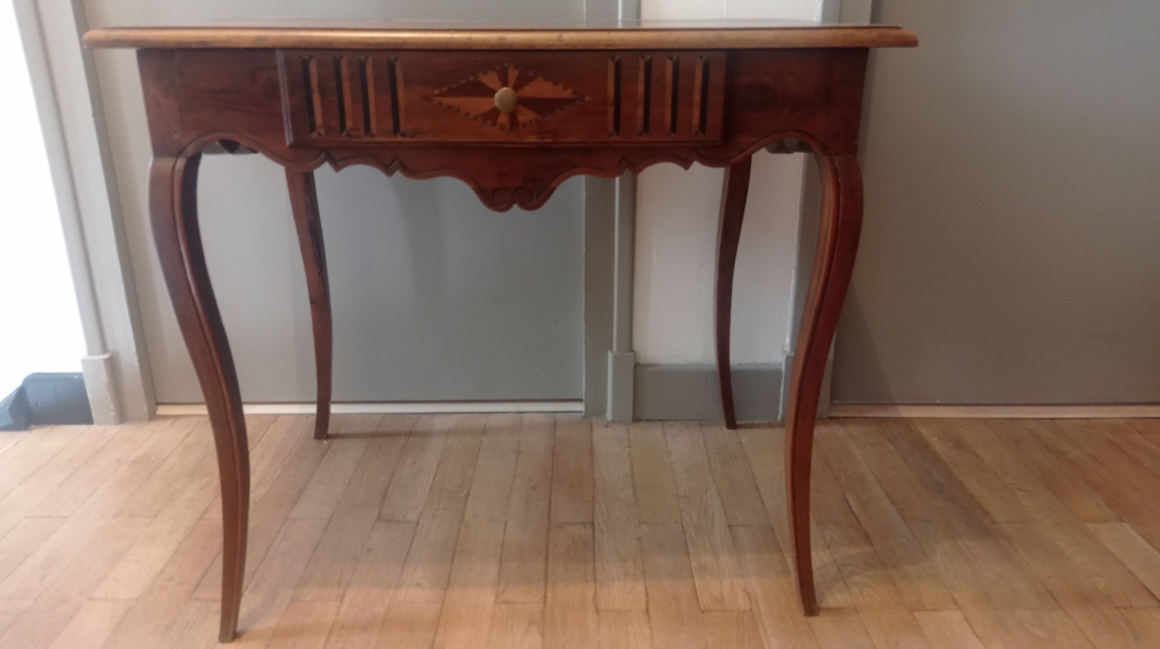 Walnut and marquetry table, 19th century.