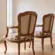 Pair of Louis XV armchairs in floral fabric and wood